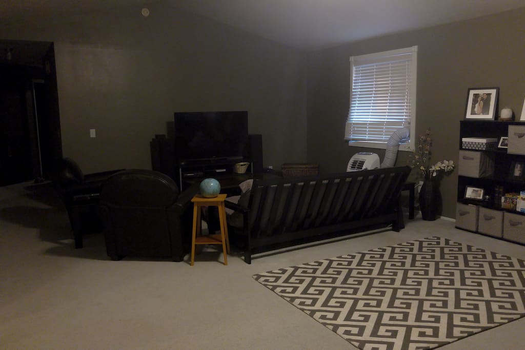 Spacious living room for guest entertainment.