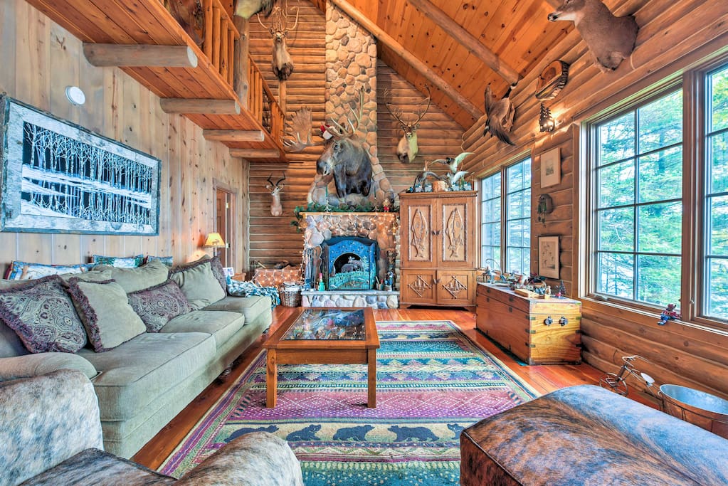 The cabin boasts a 2,000-square-foot living space with rustic decor.