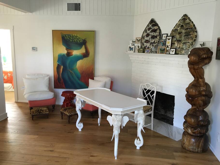 Desk and decorative fireplace in the entry way