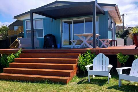 Bungalow on the beach front with fire