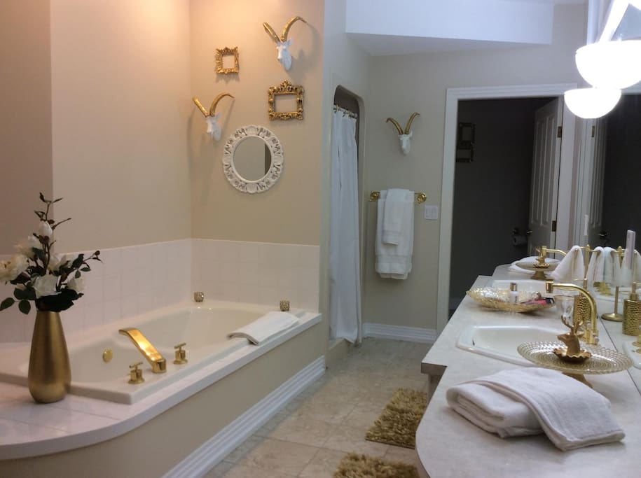 Private bathroom, jetted tub, shower, his and her sinks, walk in closet