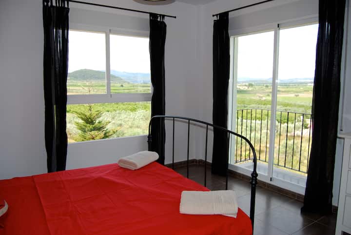 Dormitorio con baño privado