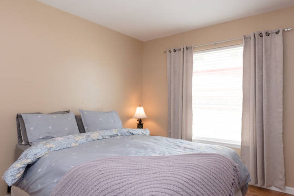 Guest Bedroom Soft light makes for perfect napping.