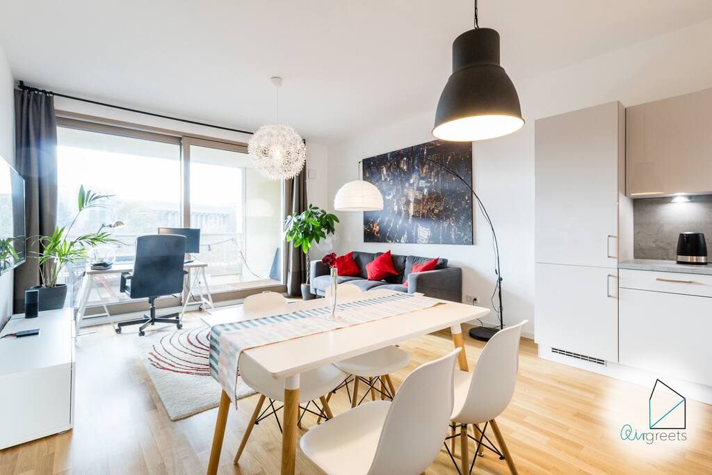 The living room has an open style and is very light-flooded.