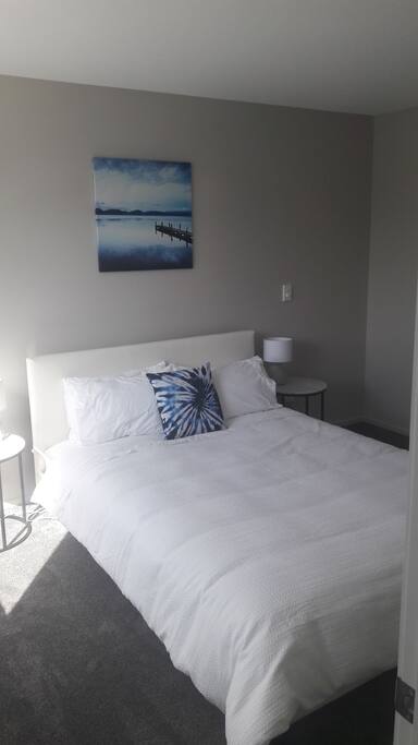 Sunny bedroom, very comfortable bed with crisp cotton linens