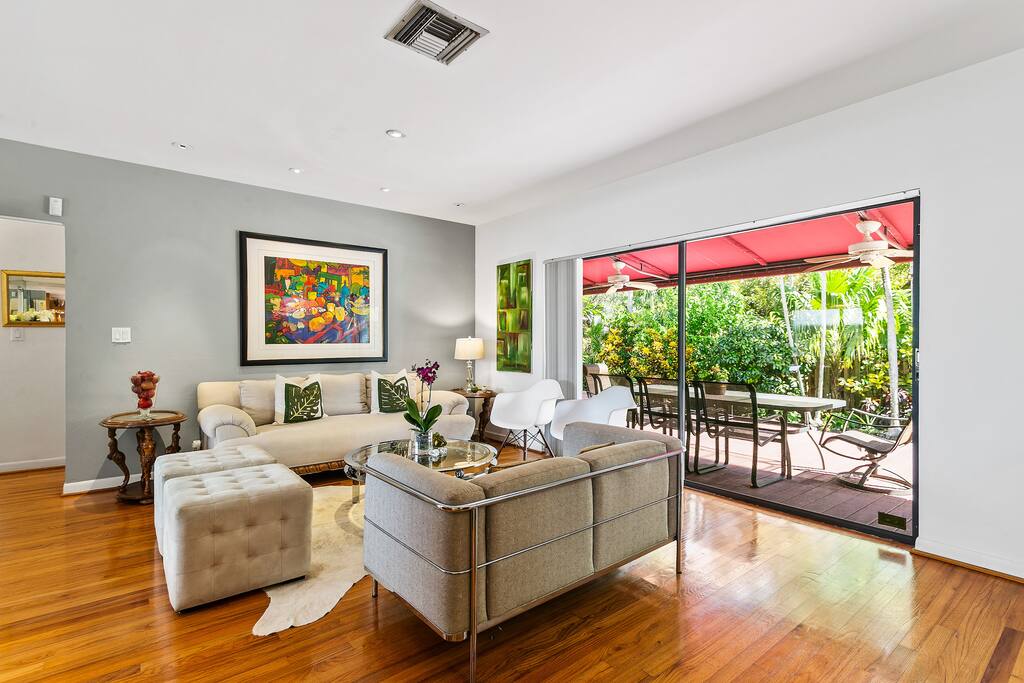 Living room looking out to the patio and garden