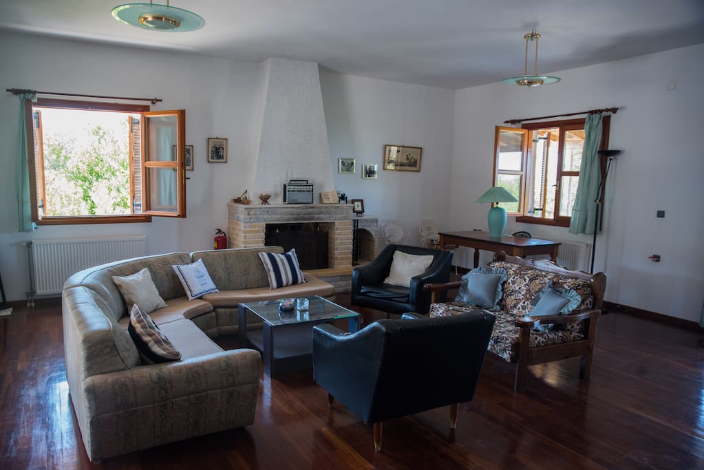 The living room. It's beautifully lit by the sunlight every time of the day, without the sun rays being a problem. It's most beautiful time is when the sun rises and sets.