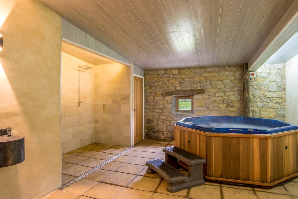 New Spa Room with hot tub and infrared sauna, a peaceful area to relax, spa treatments available.