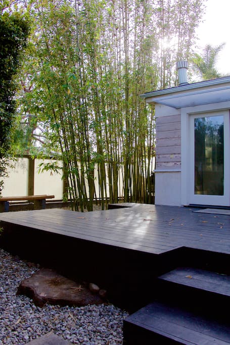 Enter through the understated gate in the 10' privacy hedge wall, and welcome