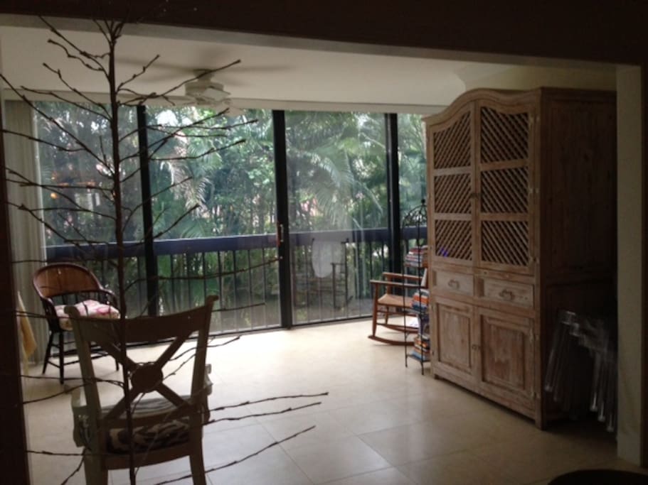 Enclosed porch, garden and river views