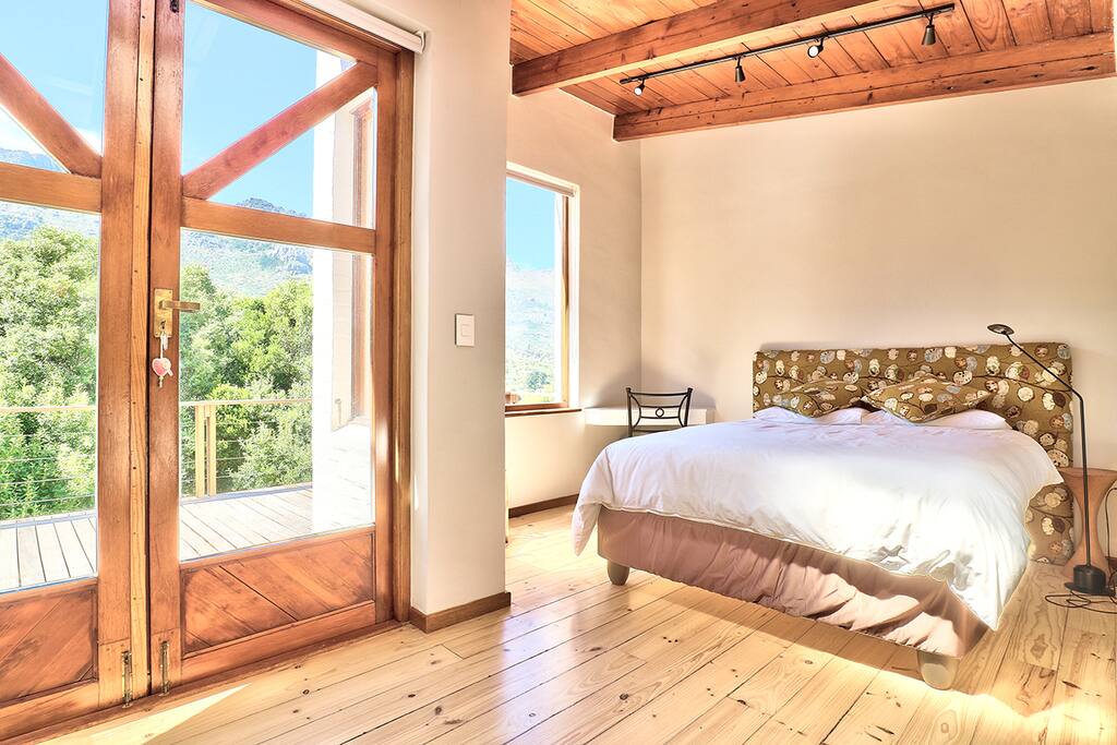 Large double doors leading to the balcony