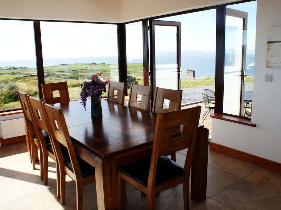 Dining room with double doors out to outside