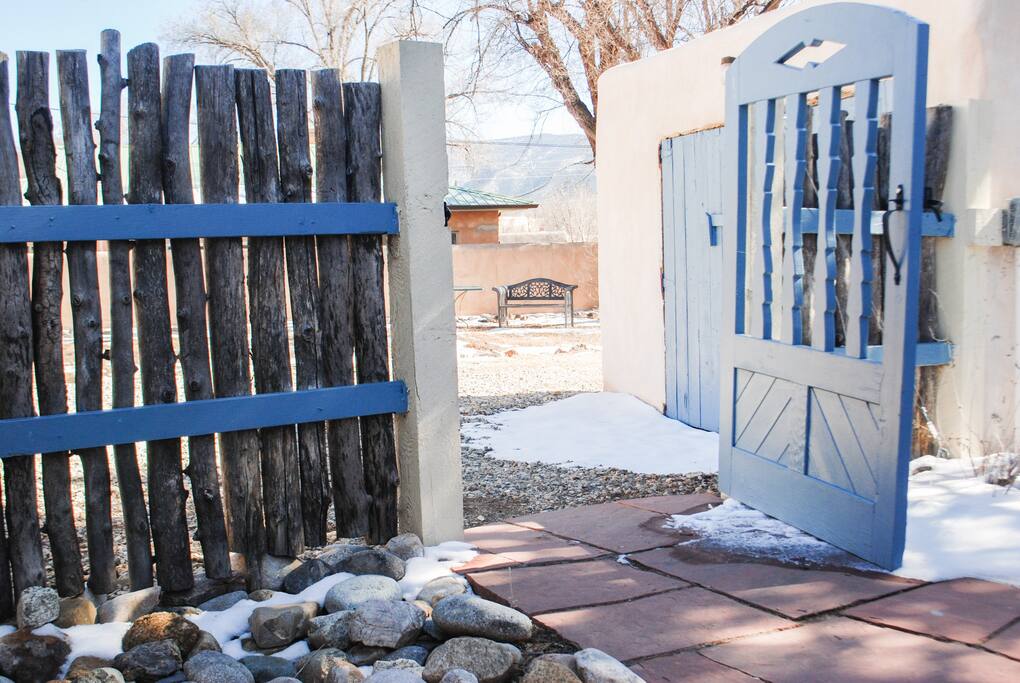 Gated patio leads to your parking area