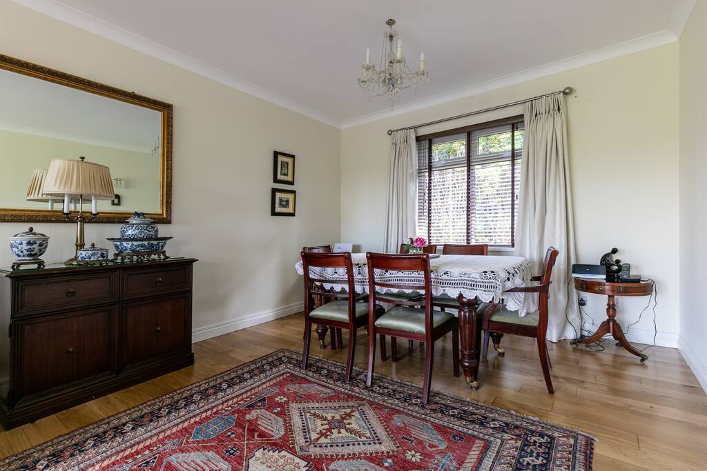 Dining table at the far end of the lounge