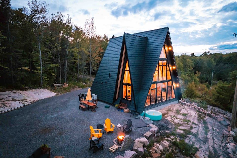 A black timber A-frame above the French River, French River, Ontario, Canada, photo 2 of 10
