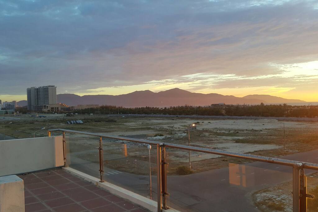 The lelf side view from rooftop is Son Tra peninsula or Monkey mountain