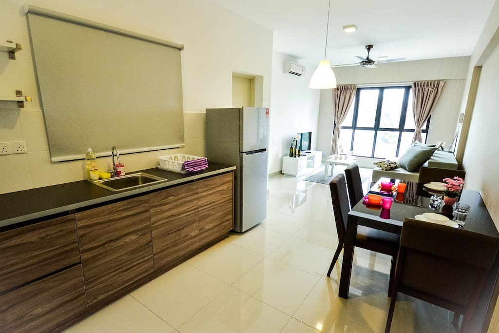 Overview from the entrance, with pantry, dining & living area in view.