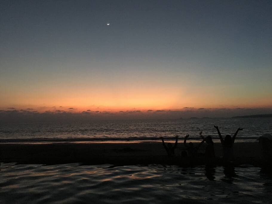 Watching the sunset in the pool