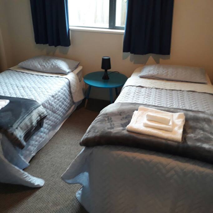 Comfy, clean room with TV and cupboard space