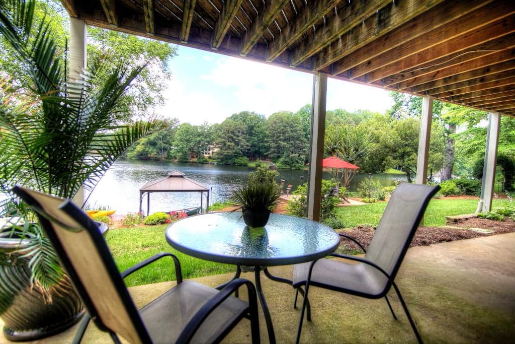 Enjoy morning coffee and evening cocktails on this patio directly outside your bedroom ...while enjoying the lake.