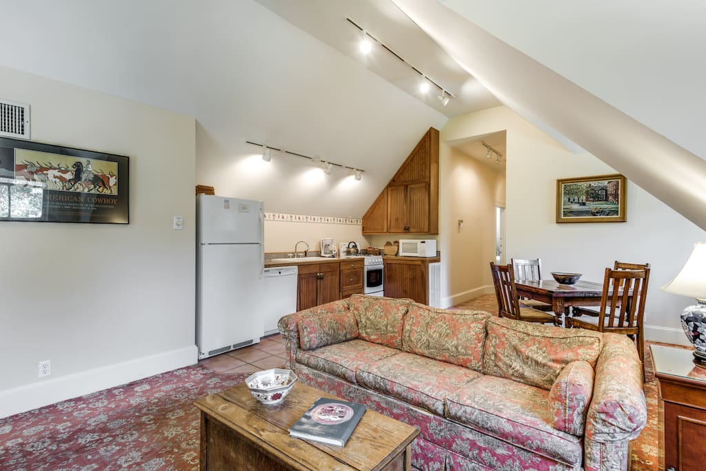 Upstairs living and dining room w/ full kitchen. This is shared by the 2 bedrooms upstairs.