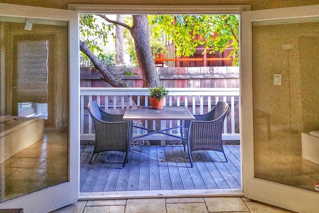 Outdoor deck with patio furniture.