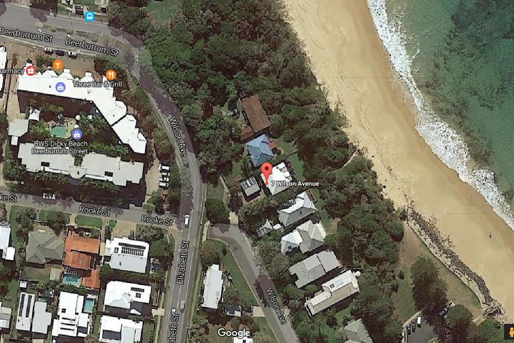 Ariel view showing Trentham House location on the foreshore of Dicky Beach at the end of the Wilson street so no passing traffic.
