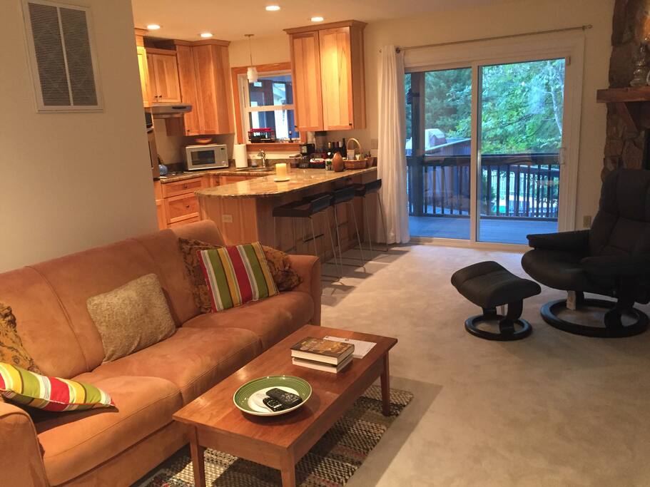 Living Room of Guesthouse Includes Full Kitchen, Private Entrance, Private Access to Pool, Private Wraparound Deck. Living Room Sleeps 2