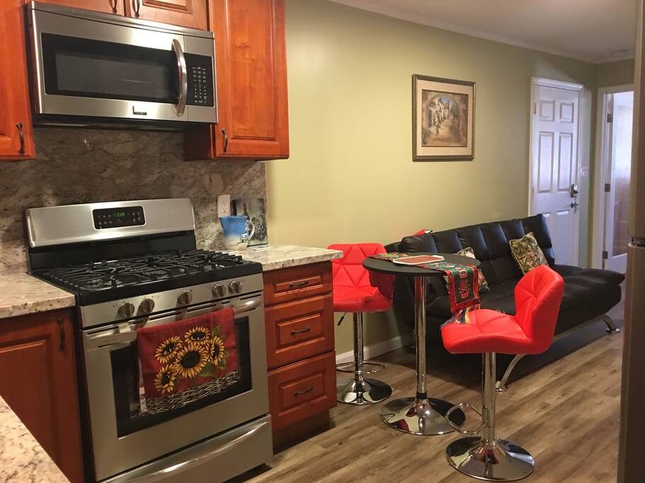Frigidaire stainless appliances: oven with stove, microwave