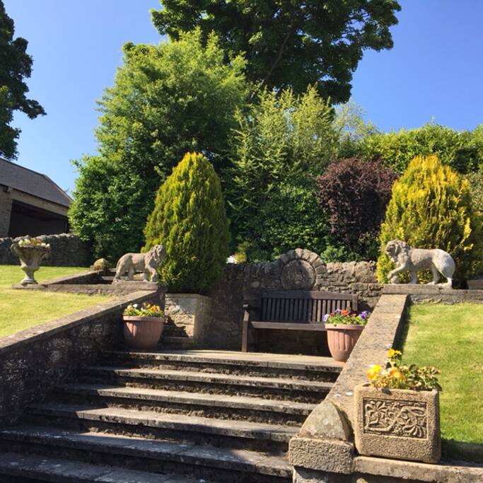 Steps leading up to the garage and gardens
