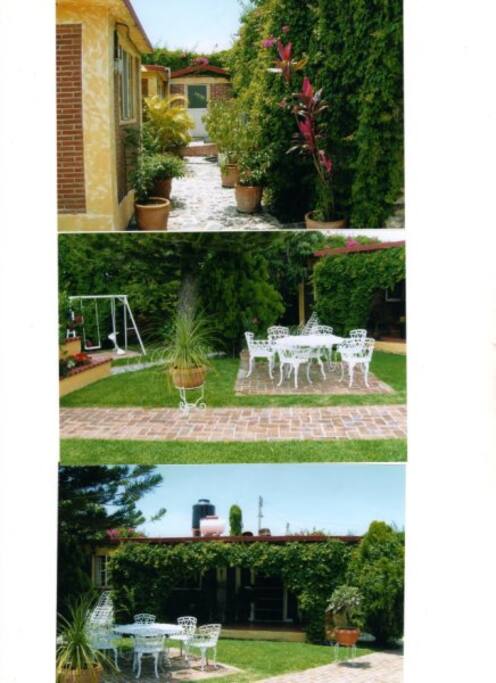 Mesa de jardín y área de columpios