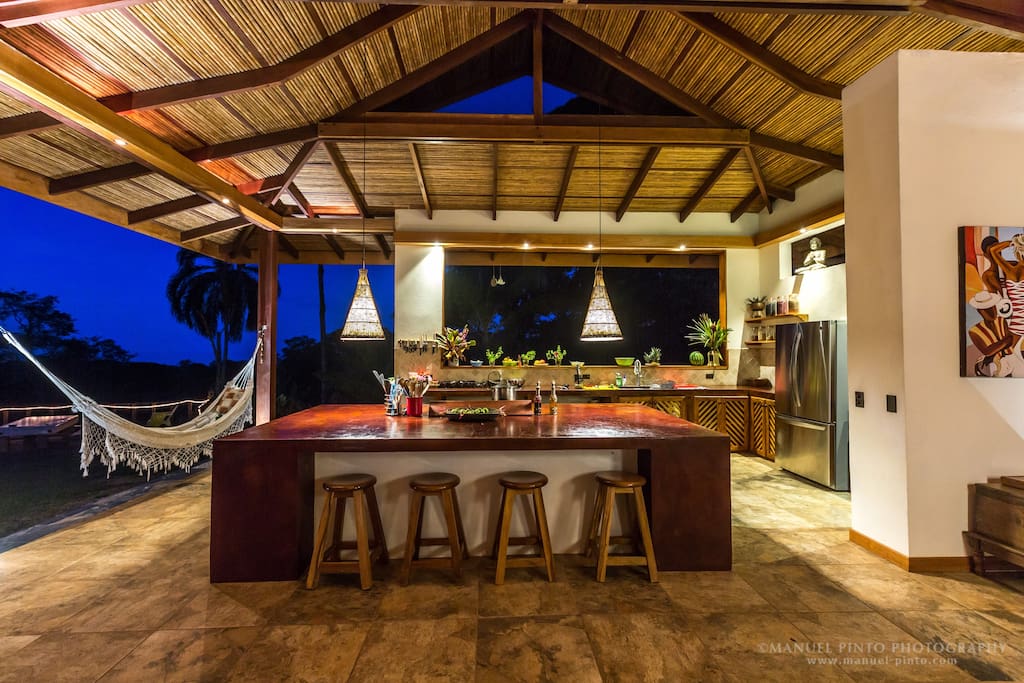 Large center island in the kitchen makes it fun to cook and entertain at the same time