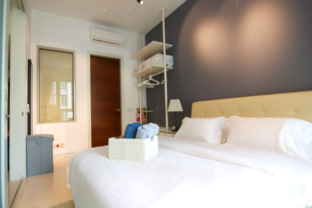 Bedroom with open wardrobe concept