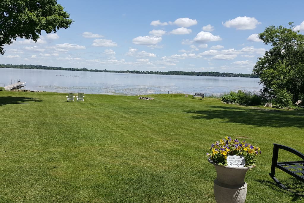 Lakefront 1/2 acre property very private and Fire pit near water.