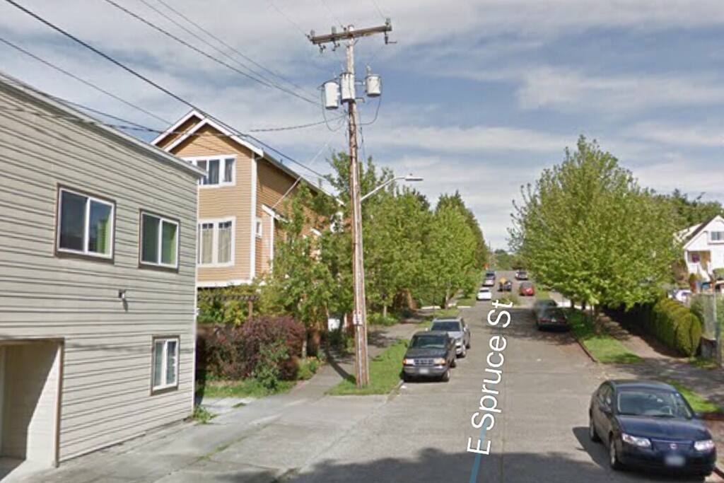 Please make sure that your car is parked on the street here. The name of the street is E Spruce which is shown clearly in this picture. PLEASE DO NOT BLOCK OR PARK ON THE DRIVEWAY BETWEEN THE HOUSES OR IN FRONT THE GARAGE DOOR.