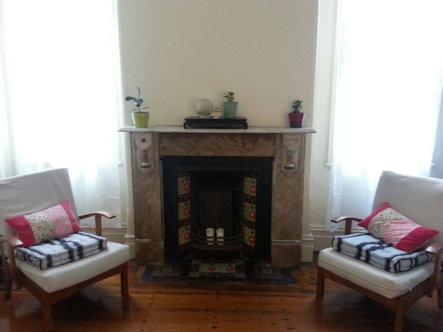 Sit beside the fireplace