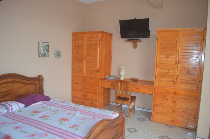 Each first floor bedroom has a TV and DVD player, a desk, two closets, a chair, a sofa,  matrimonial bed and a single bed.