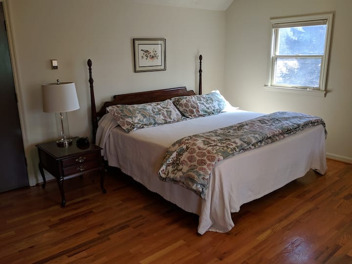 This is bedroom #3, one of the two bedrooms upstairs. This room has a king-sized bed and seating area.