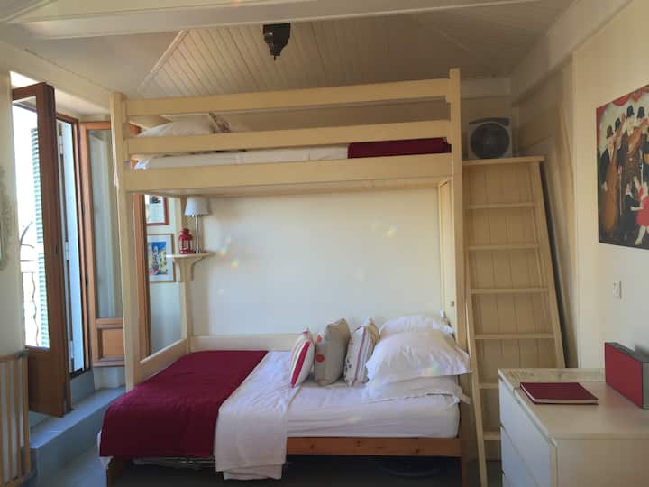 Bedroom Area with Balcony Doors