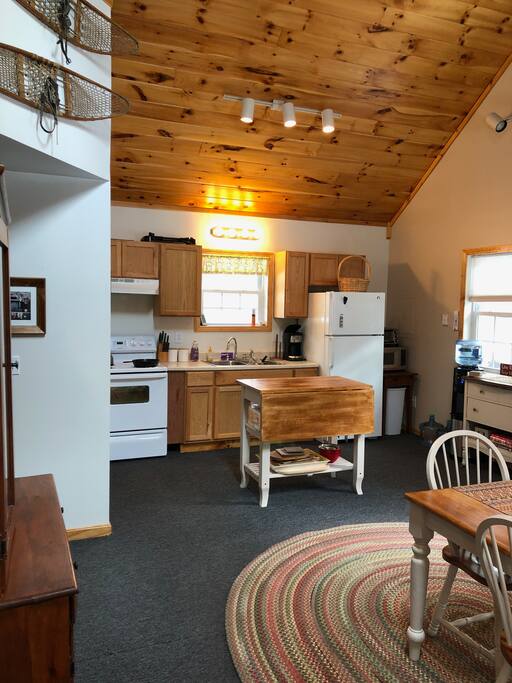 Fully equipped, very functional kitchen with a drop-leaf island for entertaining.