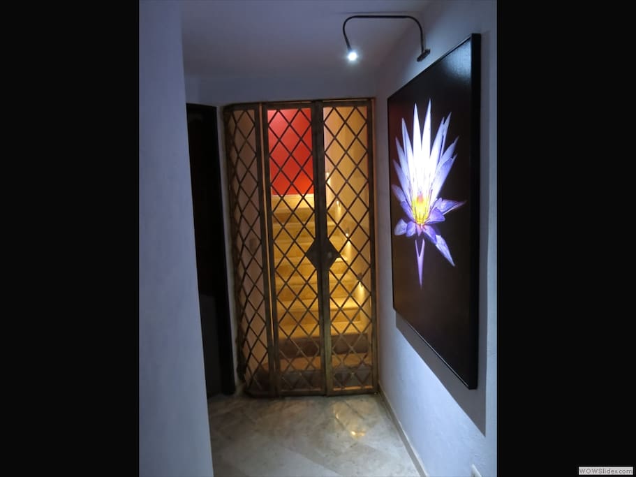 The front door leads into the main entrance hallway. Gates lead to owners unit and door on the left leads to your private guest suite.