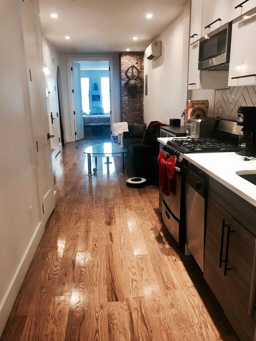 The whole length of the shared space & room at the end