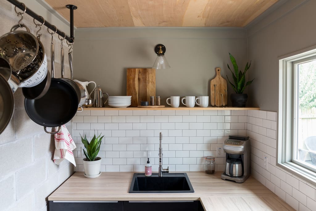 Tiny kitchen - fully stocked for all your cooking needs.
