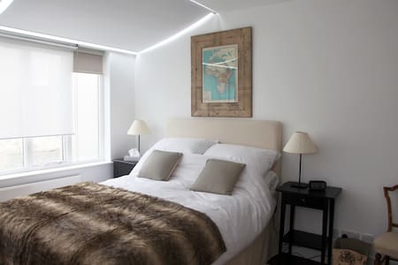 Charming double bed in family home.