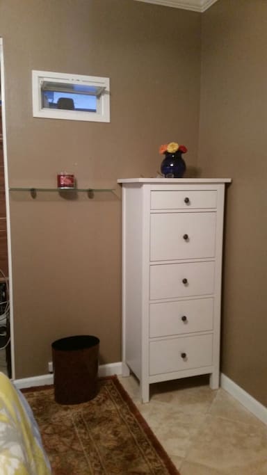 Two dressers for storing clothes.
