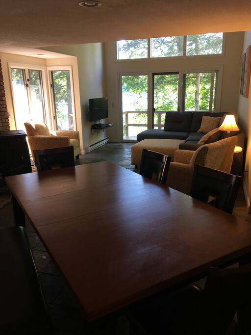 View of new in 2018 summer dining table and living room in background