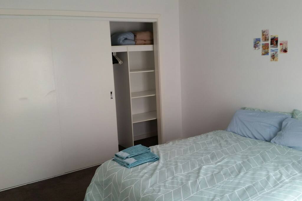 Huge wardrobe available for use, empty except for spare blankets and hangers