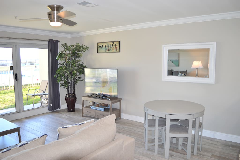 Everything is new in the Living Room! Flooring, Furniture, & Curved TV!