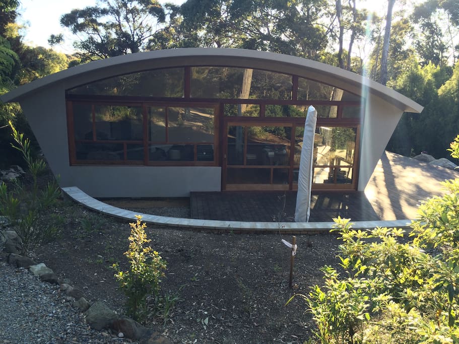 Large north east facing window wall lets in lots of light to the main room.
