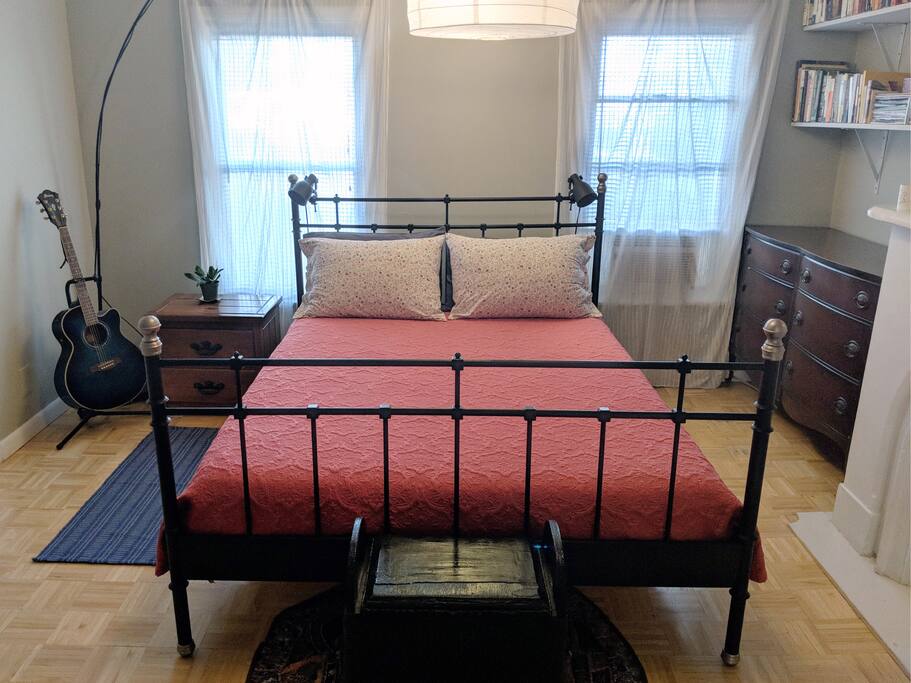 Main floor bedroom - peaceful, airy and clean.